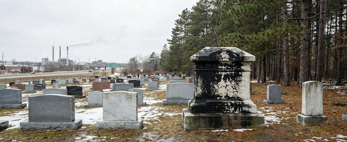 Professional headstone cleaning service in Michigan cemetery