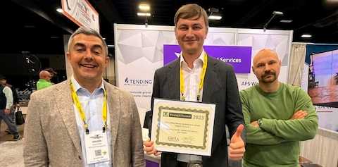 Artem Manilov, Founder of Tending, holding the 2026 ICCFA Innovation Award for grave care