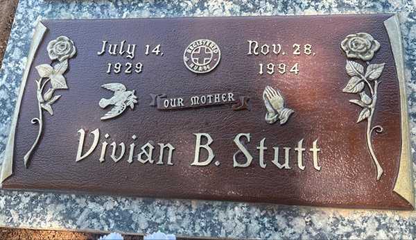 The same bronze cemetery plaque looking brand new after professional restoration by Tending
