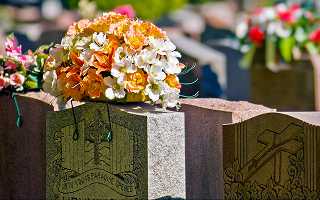 Monuments with various religious symbols in the cemetery