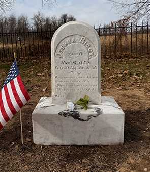 The same cemetery monument perfectly leveled, reset, and professionally cleaned by Tending