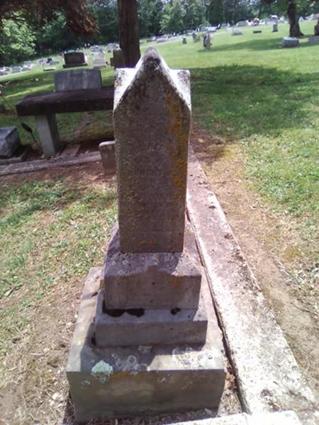 Eco-friendly cleaning, polishing, and inscription repainting for a granite headstone in Ohio / Before