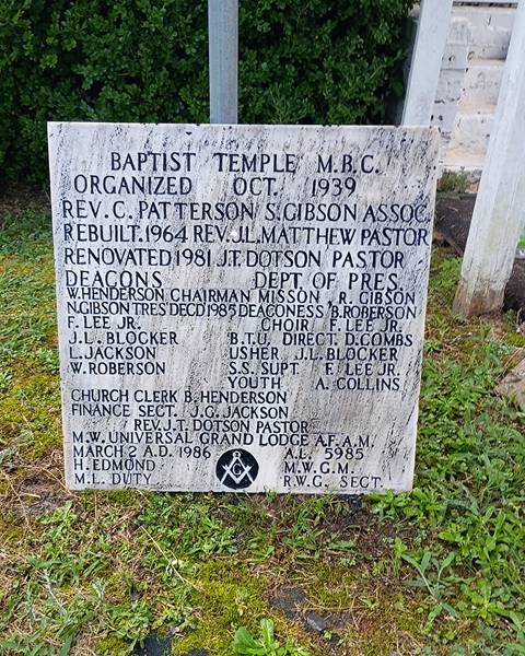 Deep cleaning, polishing, and letter repainting for a flush bronze/black granite monument in Louisiana / After