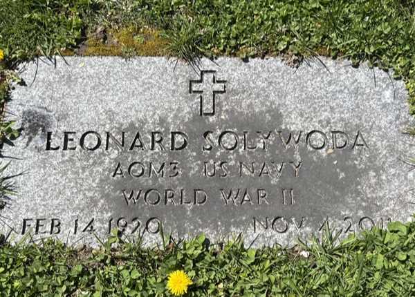 Cleaned, deep-cleaned, and polished a granite flush grave marker in Connecticut | Before