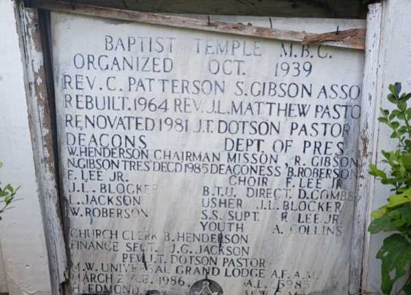Deep cleaning, polishing, and letter repainting for a flush bronze/black granite monument in Louisiana | Before