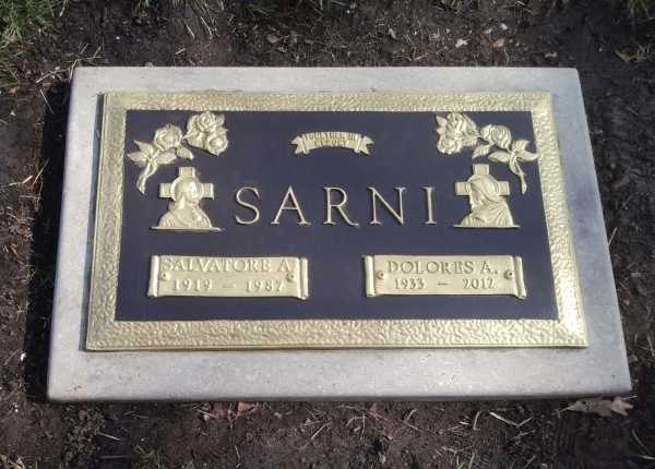 Cleaning and repainting of a metal flush grave marker in New Jersey | After