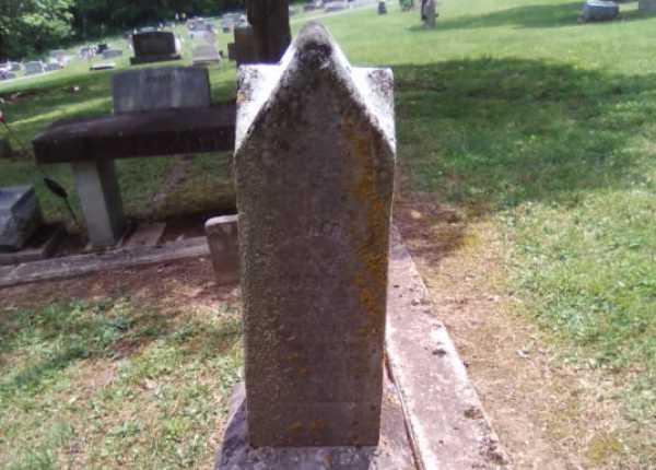 Eco-friendly cleaning, polishing, and inscription repainting for a granite headstone in Ohio | Before