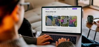 Customer ordering Tending grave care services online using a laptop